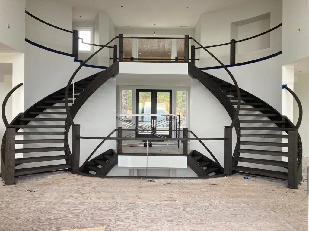 Stain and finished floating hardwood stairs