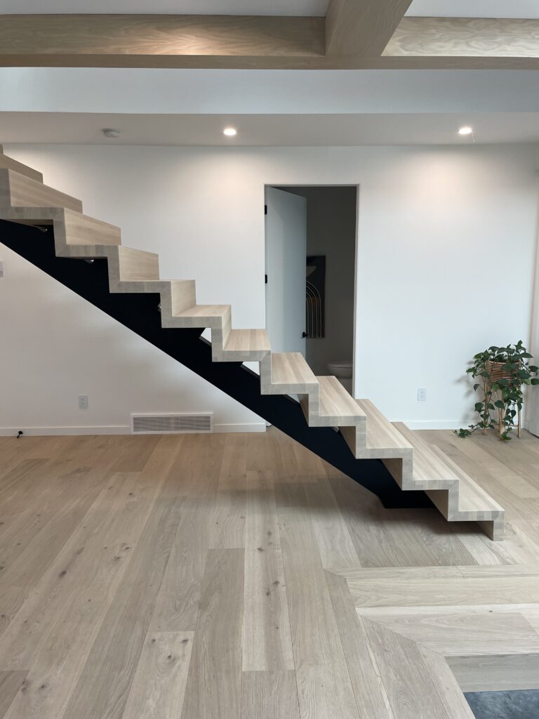 Floating 90 degree hardwood stair design