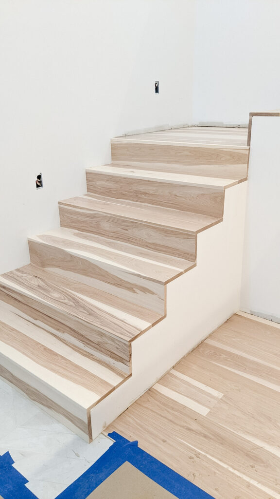 90-degree stair design in a light natural finish